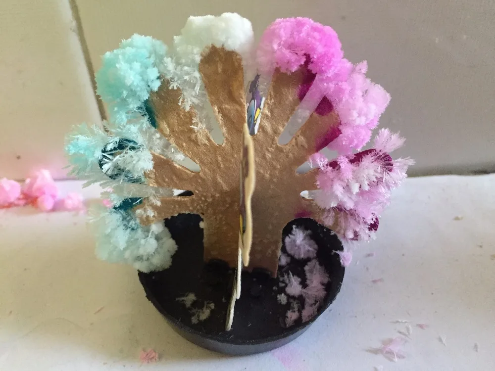 

2019 9x7cm Multicolor DIY Paper Growing Magic Peacock Tree Magically Grow Christmas Trees Arvore Magica Kids Science Toys 50PCS