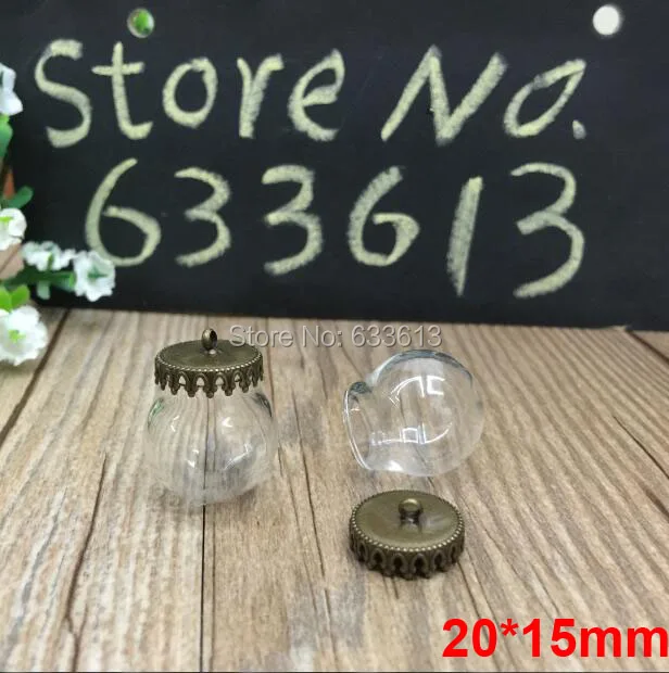 

Free ship!!! 20sets/lot 20*15mm glass globe & 15mm bronze crown base set glass globes charm glass vial pendant glass cover orbs