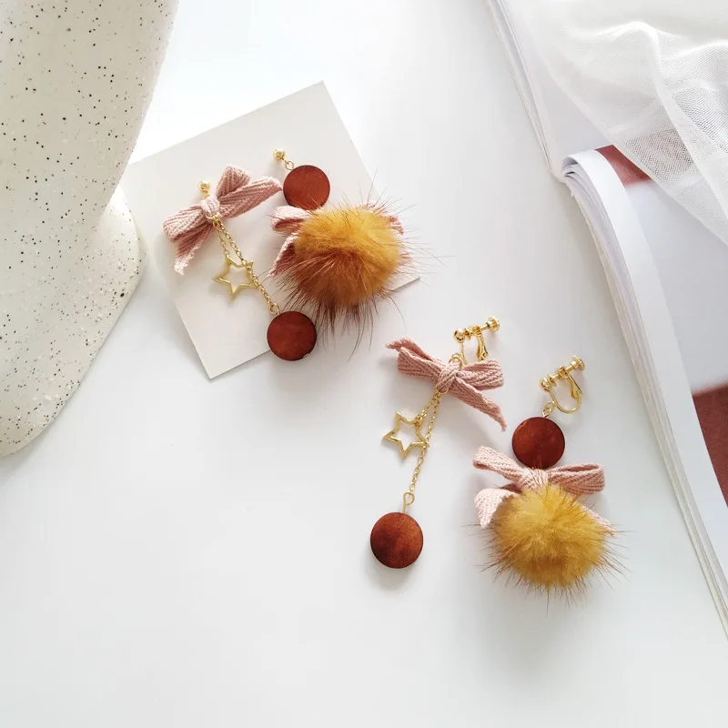 

quality of a material winter hairball ear is acted the role of fashionable all - around match girl bowknot ear clip