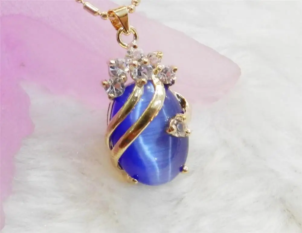 

Dark Blue Exquisite golden color 13x18mm Oval Mexican Opal Gems Pendant Necklace 5.27