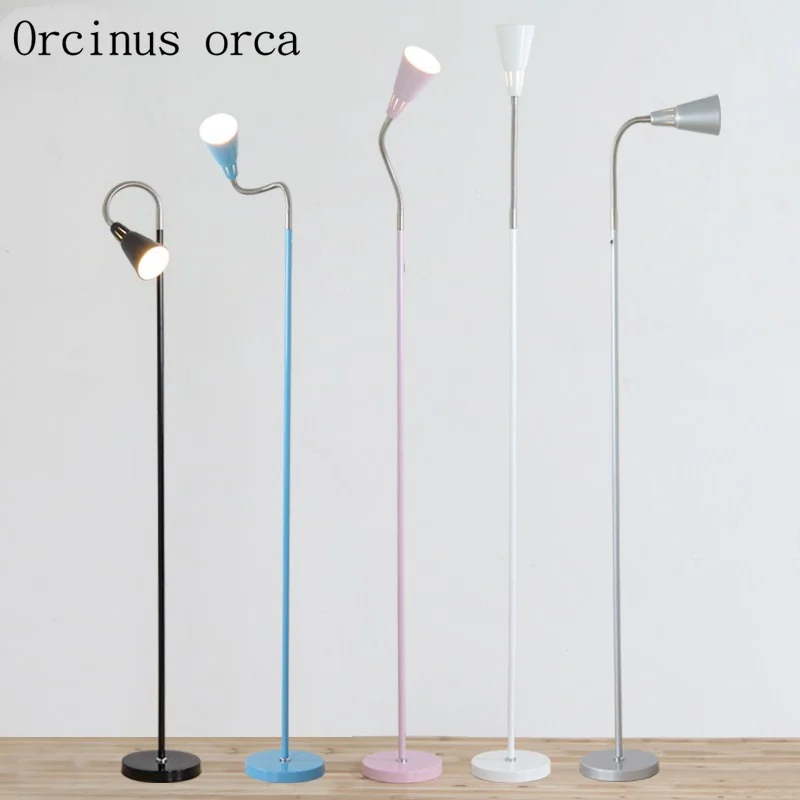 

Nordic concise modern color candy floor lamp living room bedside lamp creative personality LED iron eye protection floor lamp