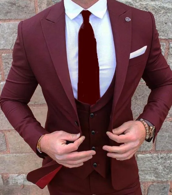 

High Quality One Button Burgundy Groom Tuxedos Peak Lapel Groomsmen Best Man Mens Wedding Suit (Jacket+Pants+Vest+Tie) W:201