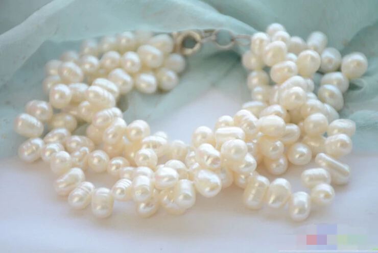 

0782 4row 8" white rice freshwater cultured pearl bracelet
