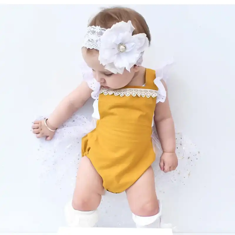 yellow onesie baby girl