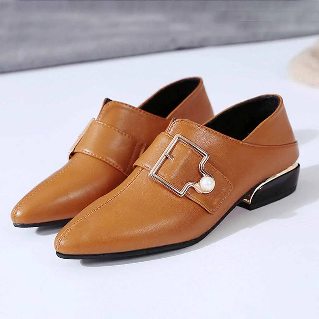pointed buckle heels