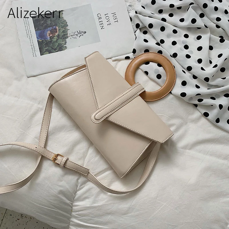 حلقة حقائب النساء الكورية جديد مغلف أنيق حقيبة السيدات الأعلى مقبض حقيبة صغيرة بسيطة حقيبة كتف نسائية ملص دي سنهورا