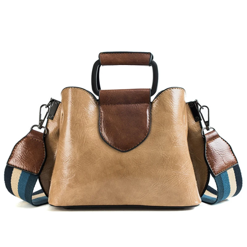 

2019 new oil wax bucket bag simple color wide shoulder strap shoulder diagonal mobile handbag