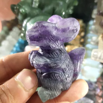 

Hand-carved squirrels of natural color fluorite are used as home decoration
