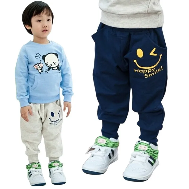 Осень мода Sweatpant улыбаясь печатные Обувь для мальчиков Брюки для девочек повседневные штаны Одежда для маленьких мальчиков