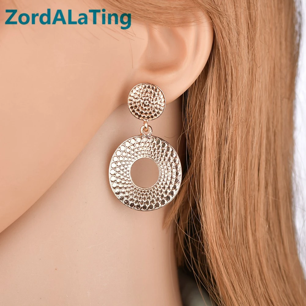 

Golden alloy double circle hollow out boho ethnic hyperbole style simple earrings for women retro earring drop for party girl