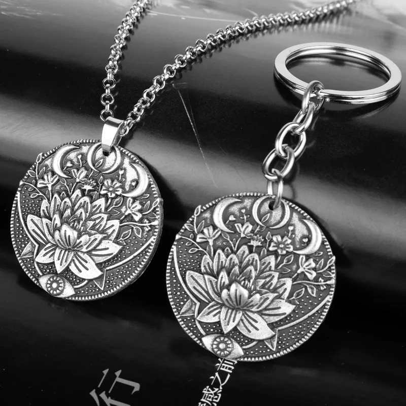

1pcs 2019 Wicca Lotus eyes moon pendant Key chain Prettiest women Mandala flower Keyring Phase Lotus Meditation Yoga jewelry