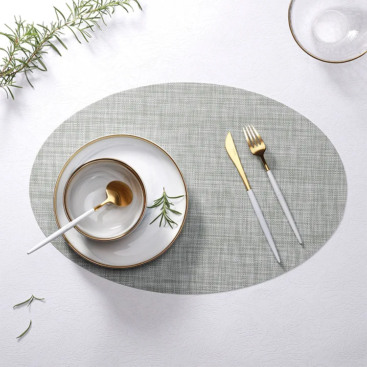 

New Arrivals Oval plastic non-slip insulated dining table mat Western restaurant coasters solid color PVC mats wholesale