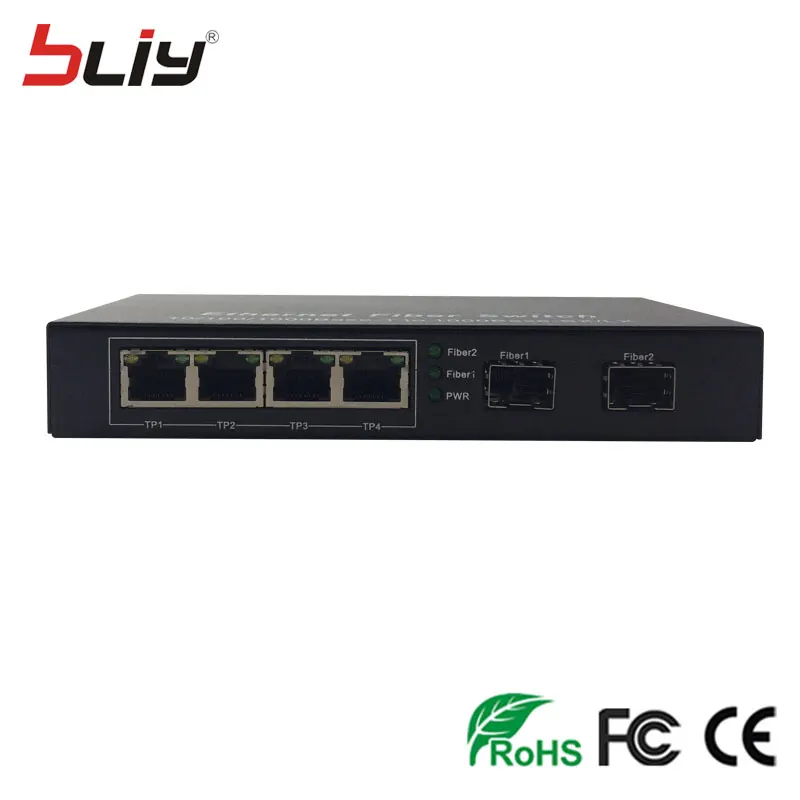 2 sfp slot fiber optical gigabit switch sfp to 4 rj45 UTP ports ethernet media converter SC single mode FTTH GPON terminal 2 sfp slot fiber optical gigabit switch sfp to 4 rj45 UTP ports ethernet media converter SC single mode FTTH GPON terminal