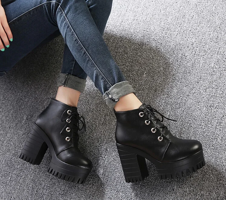black boots with shoelaces