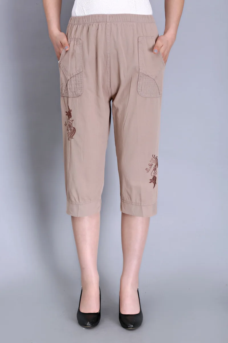 

High waist women fashion loose floral embroidery elastic waist harem pants female trendy knee-length casual capris cotton bottom