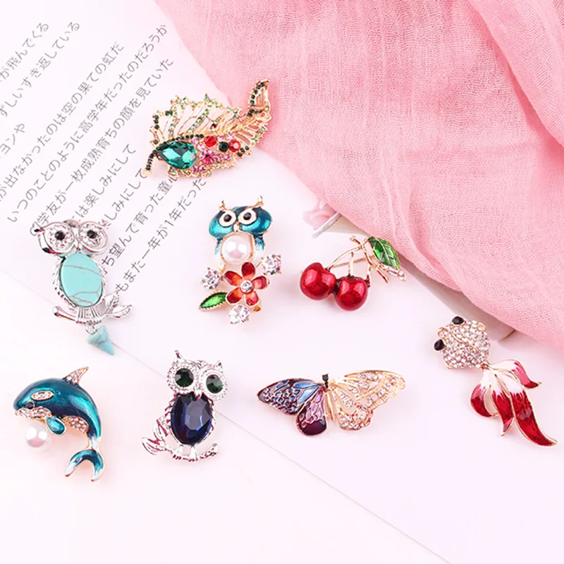 

LUBOV 24 styles Crystal Stone Inlaid Hollow Out Gold Color Metal Leaf Brooch Pin Trendy Women Costume Jewelry Gift for Girls