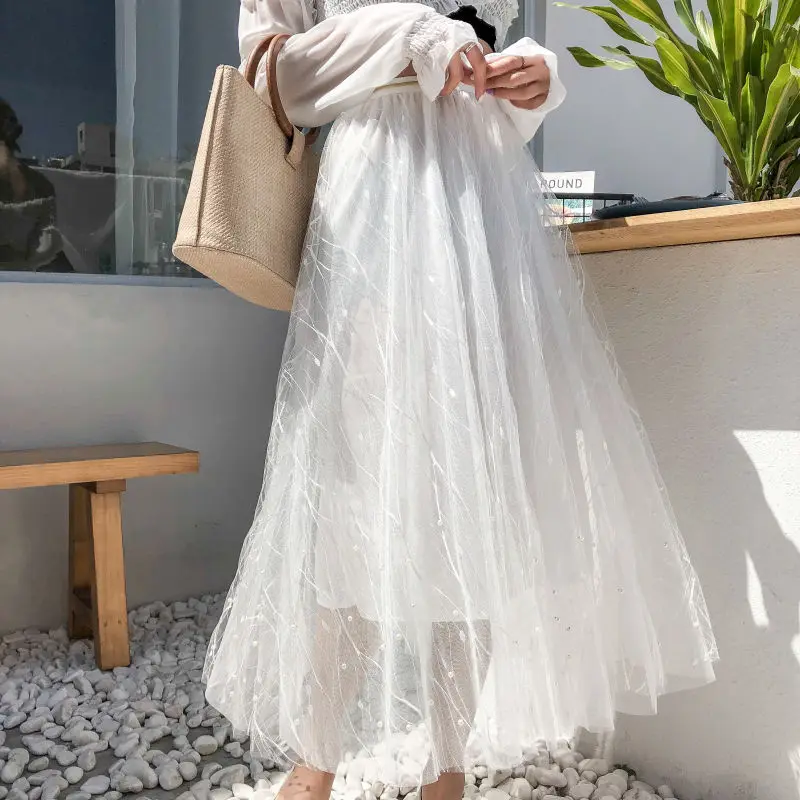 

Black and white beaded mesh skirt lace female college high waist wild big swing irregular skirt fluffy half knee skirt