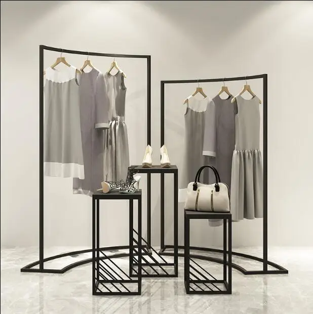 

Clothing store display rack in the island display cabinet women's shop horizontal bar iron art