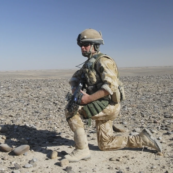 A British Army soldier on a foot patrol in Afghanistan Poster Print (34 x 22)