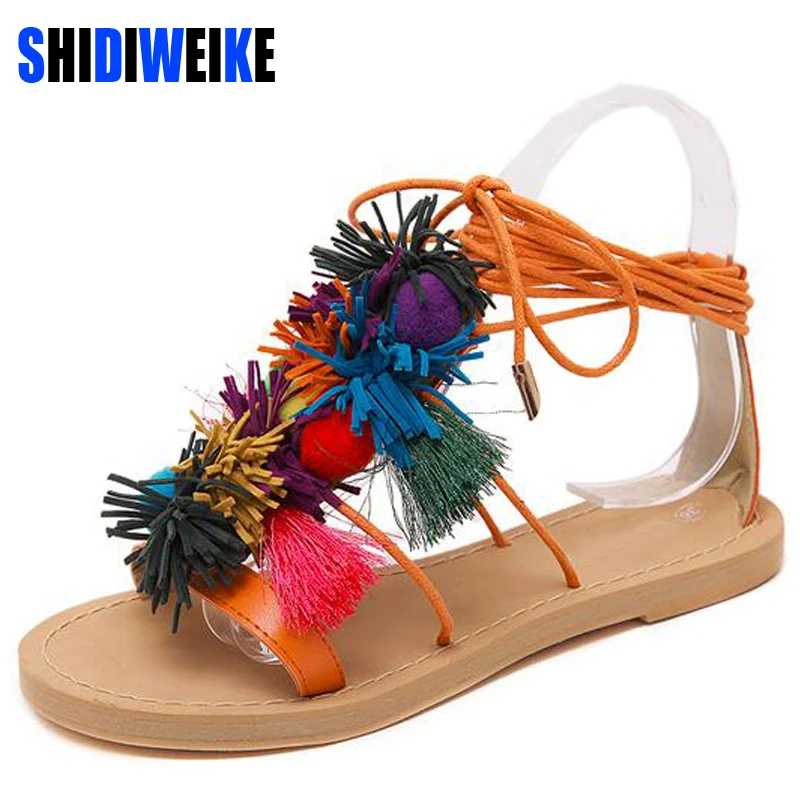 

Summer New Colorful Fringe Flower Ball PomPom Sandals Sandals Flat with Roman Gladiator High Lace Thong Flip Flop Shoes Woman
