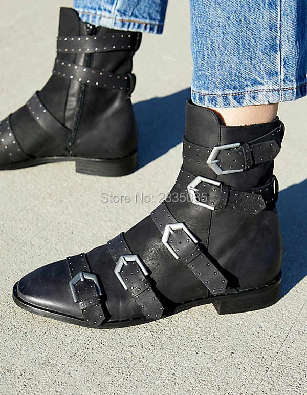 black boots with silver buckles