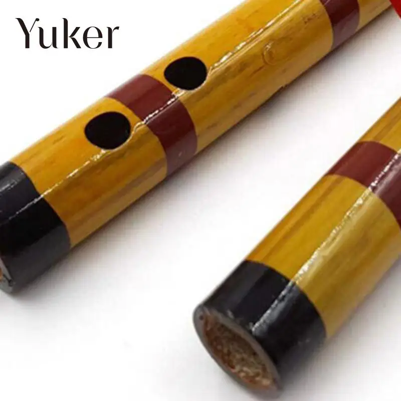 Instrumento de viento chino tradicional de la flauta de bambú de la llave F del principiante con la cuerda roja