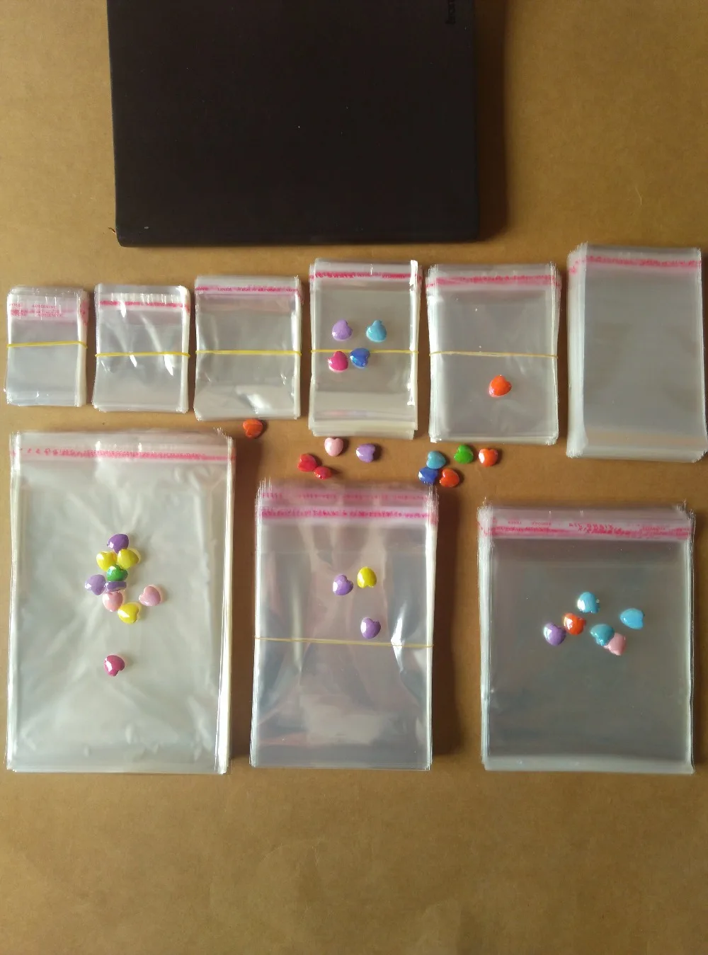 

100pcs/lot free shipping Storage Bags Clear Self Adhesive Seal Plastic Packaging Bag Resealable Cellophane OPP Poly Bags Gift Ba