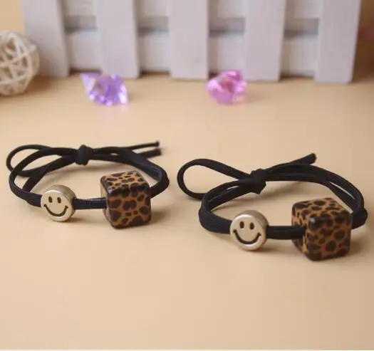 

Party Favors Hot Sell fashion leopard square smiley net red head rope hair ring wild simple cute horsetail rubber band