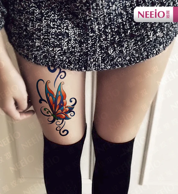 Butterfly tattoos on back of leg