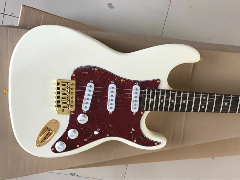 Electric guitar and 3 pickup cards, red guard board, gold hardware, Rosewood Fretboard, provide cutting, free delivery. Electric guitar and 3 pickup cards, red guard board, gold hardware, Rosewood Fretboard, provide cutting, free delivery.