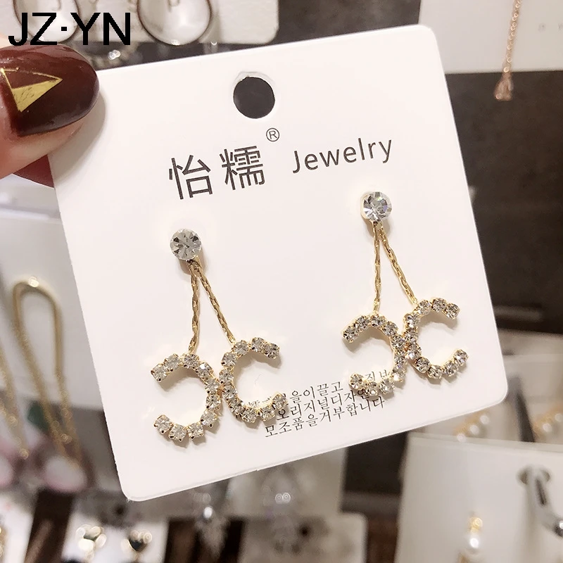 

JZYN 2019 Double C silver needle earrings crystal earrings high quality earrings designed for women of noble elegance