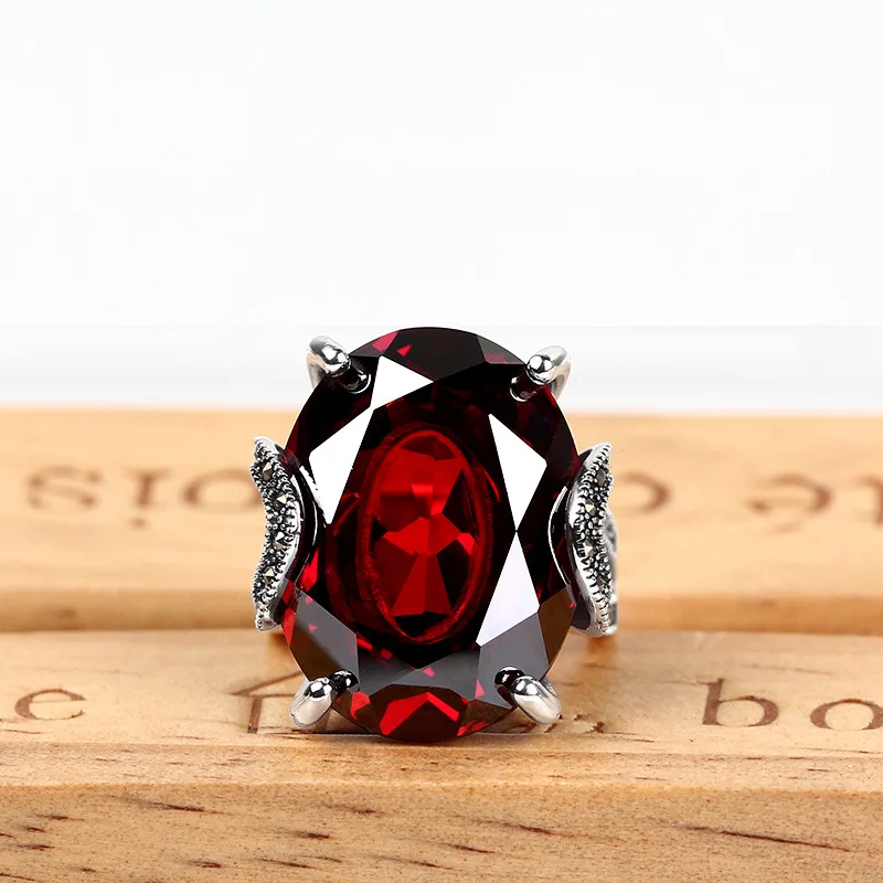 

Sterling silver vintage garnet live mouth ring Thai silver fashion atmosphere open index ring ladies
