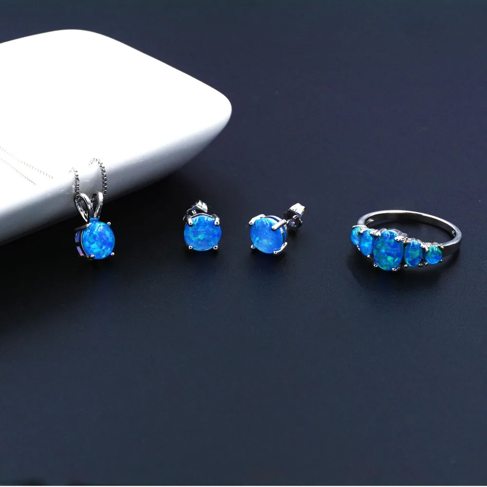 

Mystic Ocean Blue Fire Opal Jewelry Set Necklace + Earrings + Ring