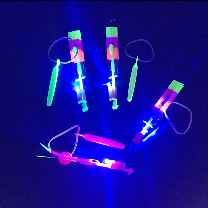 Led toys 100PCS Colorful LED Light Slingshot Elastic Rocket Helicopter