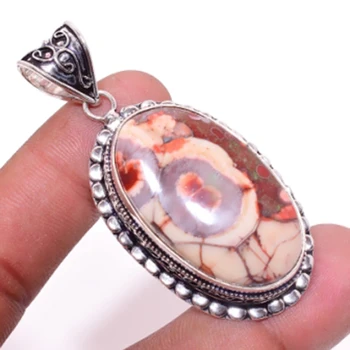 

Maxican Bird's Eye Pendant Silver Overlay over Copper , 59 mm, P6525