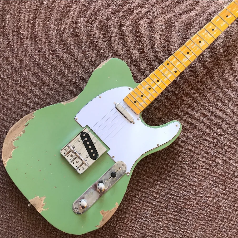 

tele electric guitar.handwork 6 Strings electric guitarra.Maple fingerboard,green color top.Chrome hardware.real photos