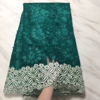 

Latest design bridal wedding lace fabric high quality hot sale 3d flower French net lace fabric with beads embroidery
