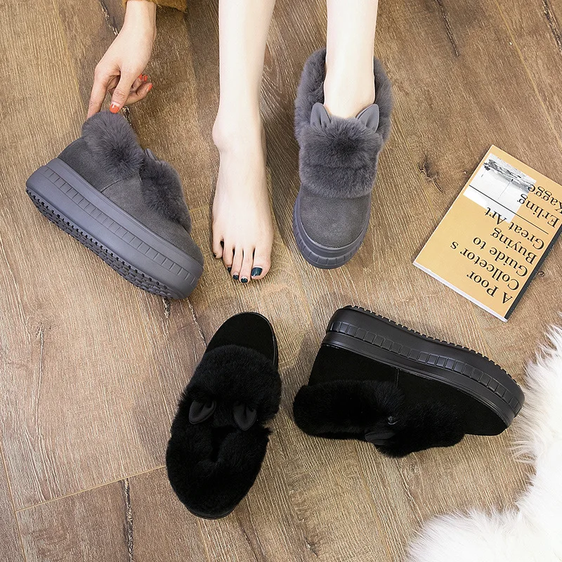 

2018 fur one snow boots winter new thick leather rabbit fur shoes women's shoes.