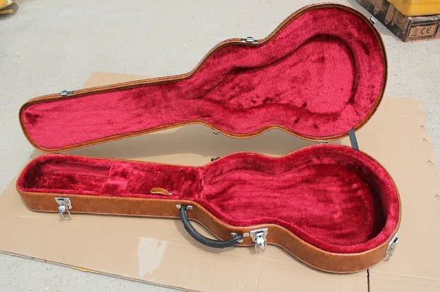 Cheap Electric Guitar brown Hard case with red lining Not sold separately ,sale with guitar together