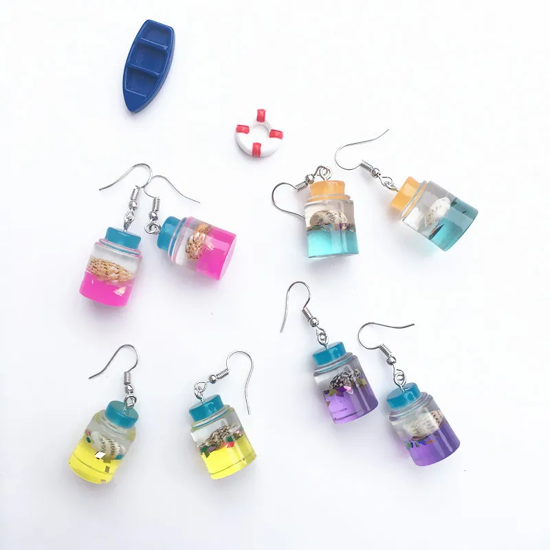 

2019 New Design Funny Drifting Bottle Conch Charm Earrings Creative Cute Resin Handmade Earrings for Woman Unique Jewelry Gift
