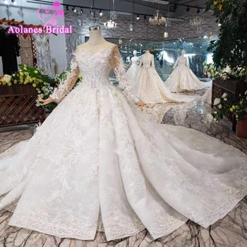 

2019 Lace Long Sleeve Vestido De Noiva Wedding Dress Luxury Appliques Dubai Arabia Feathers Crystal Beads Ball Gown Wedding Gown