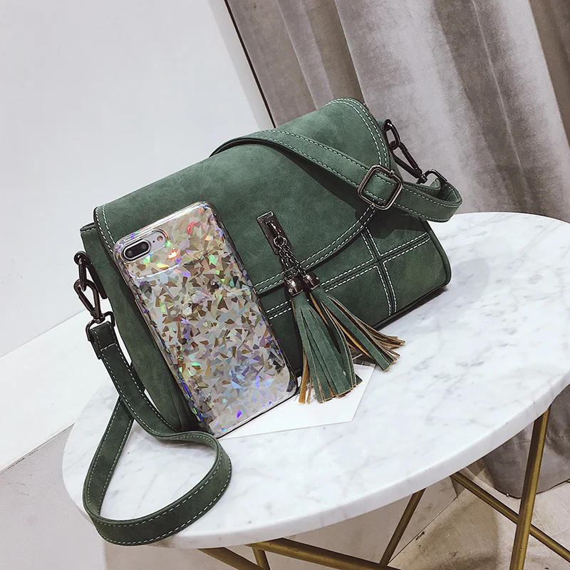 Nubuck شرابة المرأة حقيبة ساع النساء مصمم النساء حقائب عالية الجودة أكياس الإناث حقيبة كتف المرأة CrossBody حقيبة صغيرة Nubuck شرابة المرأة حقيبة ساع النساء مصمم النساء حقائب عالية الجودة أكياس الإناث حقيبة كتف المرأة CrossBody حقيبة صغيرة