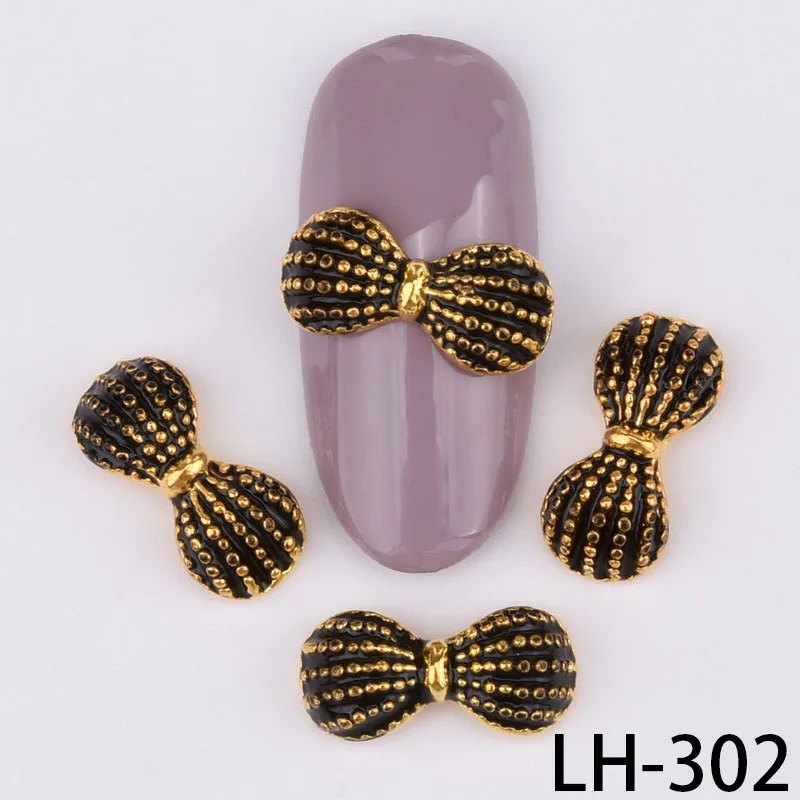 10 pcs 3D Fashion DIY Bow tie Alloy Rhinestones Nail Art decorations glamour Glitters Nail accessories LH298-309 - Цвет: LH-302