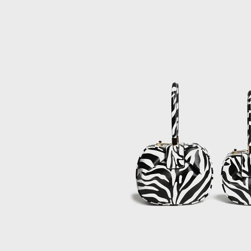 

LOEIL European and American fashion with the bag leather ladies portable retro jingle zebra pattern dumplings wonton bag