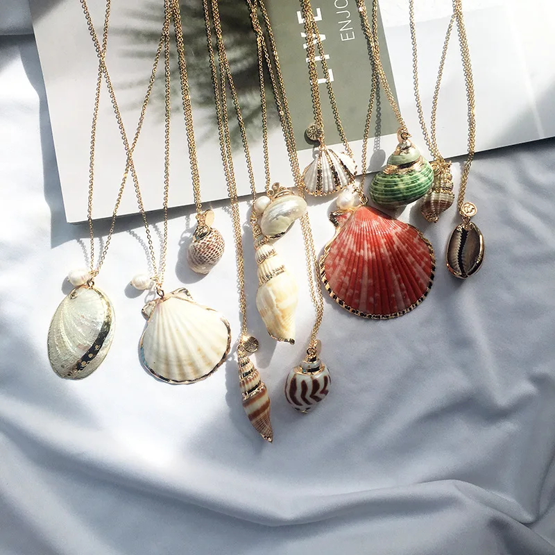 

JCYMONG 12 Style Sea Ocean Shell Cowrie Conch Starfish Pendant Necklace For Women New Bohemian Summer Beach Fashion Jewelry 2019