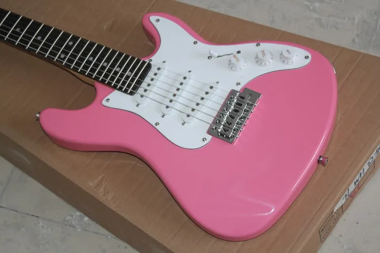 Factory customized pink electric guitar, White Pickguard, 3 S pickup, rose wood finger board, customized, free delivery. Factory customized pink electric guitar, White Pickguard, 3 S pickup, rose wood finger board, customized, free delivery.