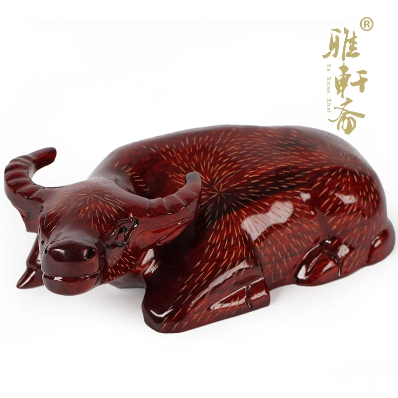

T rosewood woodcarving and ox woniu wood brought reminders Cai feng shui ornaments business gifts