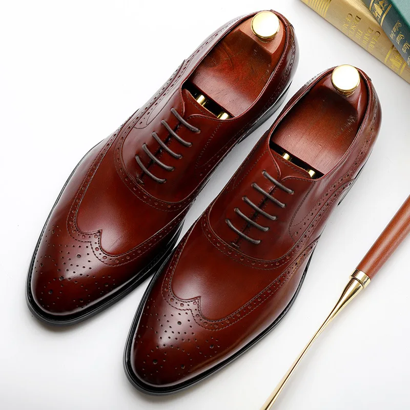 

Explosion models fashion men's Korean version of the dress leather wedding shoes leather Bullock carved men's shoes first layer