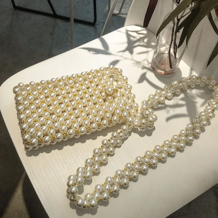 

2019 spring and summer ins with the same paragraph pearl heavy metal diagonal bag shoulder beach holiday small bag