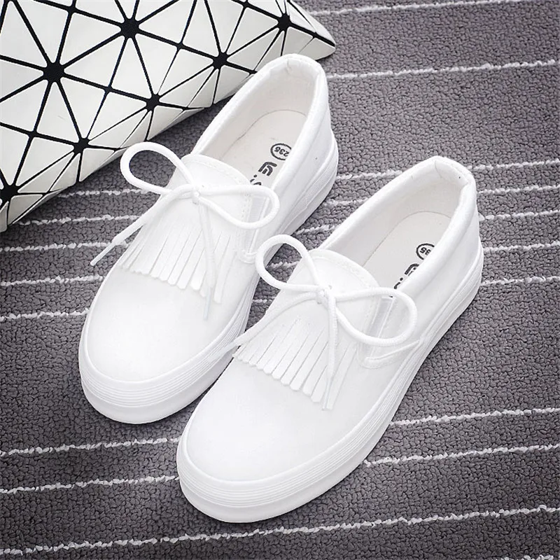 flat white canvas shoes
